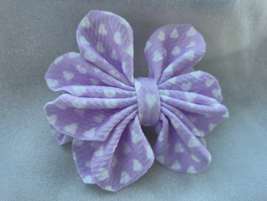 Large, lilac bow with white hearts