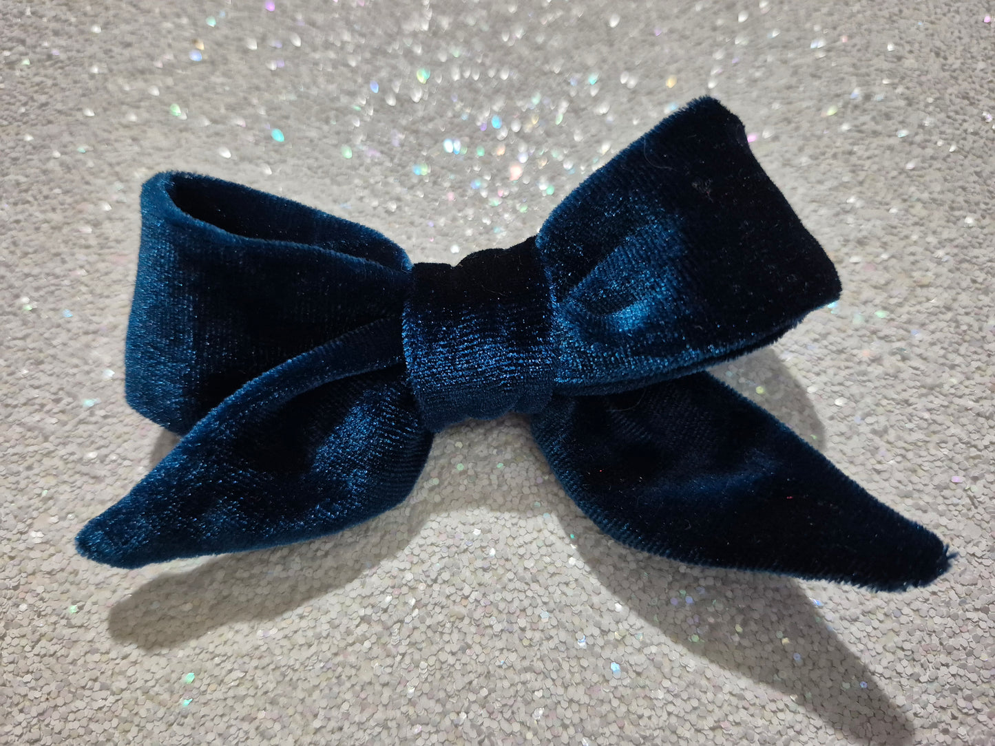 Small blue velvet bow